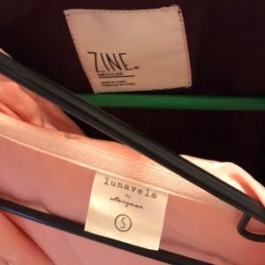 Baby pink and maroon windbreakers